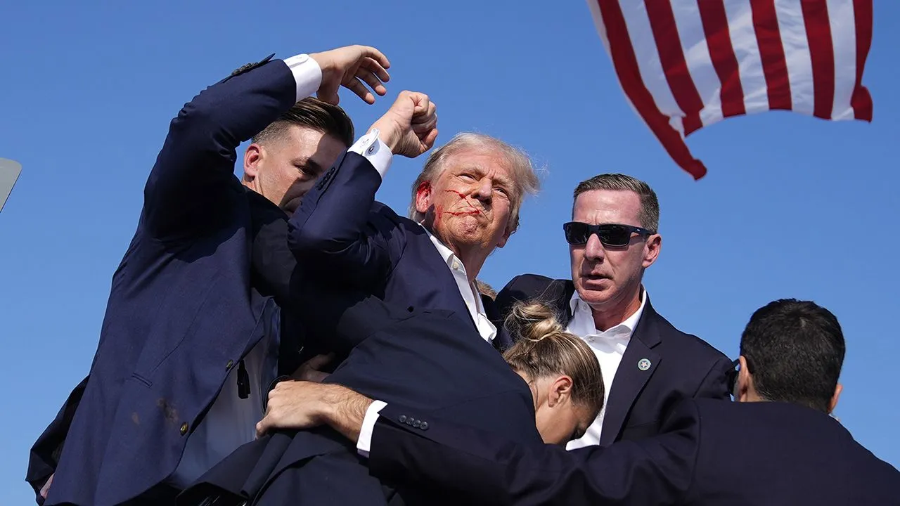 15057100_071324-wpvi-trump-campaign-incident-fist-pump-AP-photo-img.webp