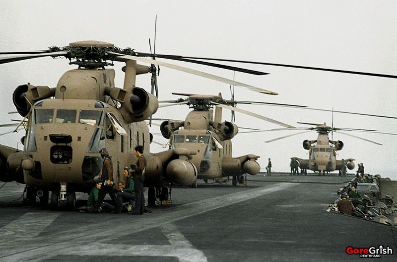 3-sea-stallion-helicopters-ready-USS-Nimitz-apr24-1980.jpg