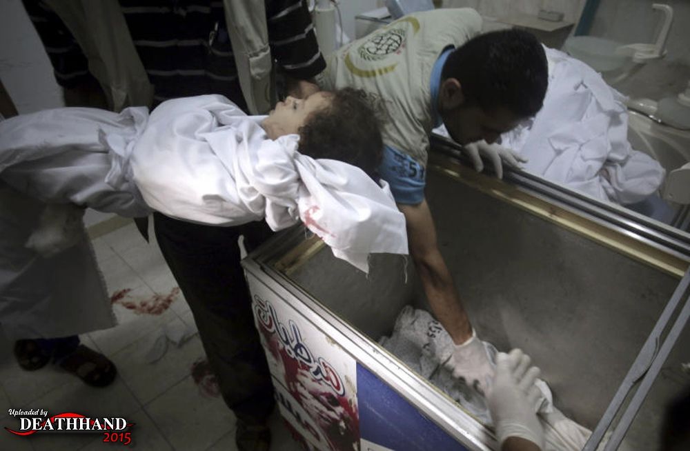 babies-children-stored-in-ice-cream-freezer-at-morgue-1-Rafah-Gaza-aug-3-14.jpg