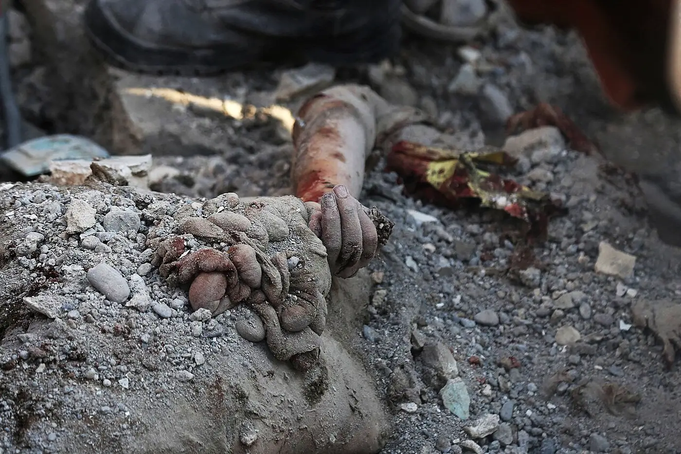 Body of schoolgirl trapped in rubble at the Shajareh Tayyebeh school, Minab, Iran, Feb 28 2026.webp