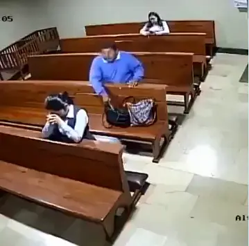 CCTV Shows moment man stole Purse from a members purse picture 3.webp
