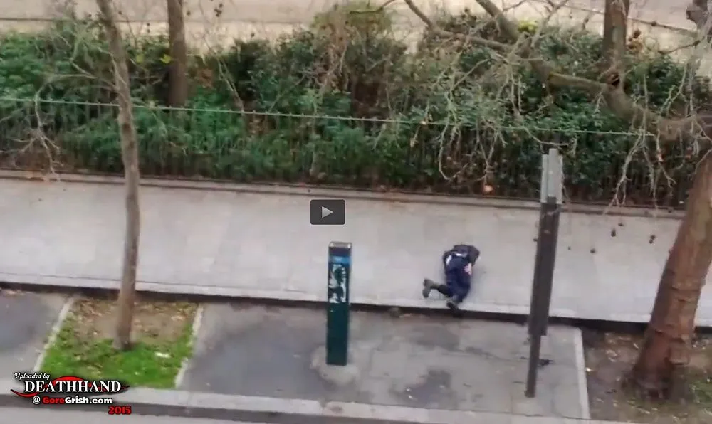 charlie-hebdo-office-attack-gunman-kills-cop-3-Paris-FR-jan-7-15.webp