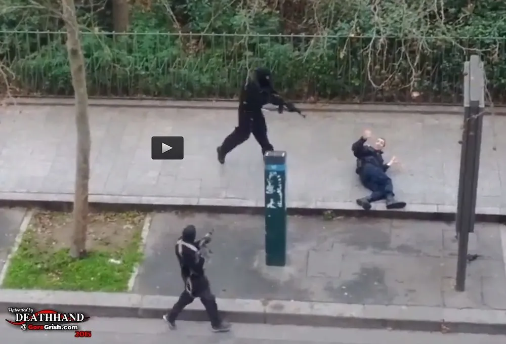 charlie-hebdo-office-attack-gunman-kills-cop-5-Paris-FR-jan-7-15.webp
