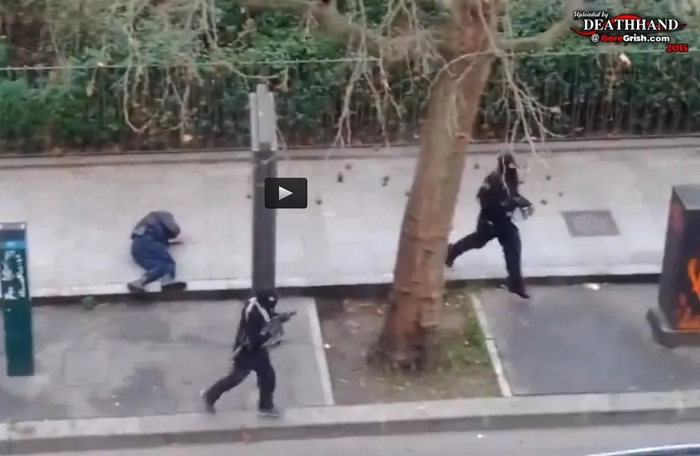 charlie-hebdo-office-attack-gunman-kills-cop-7-Paris-FR-jan-7-15.webp