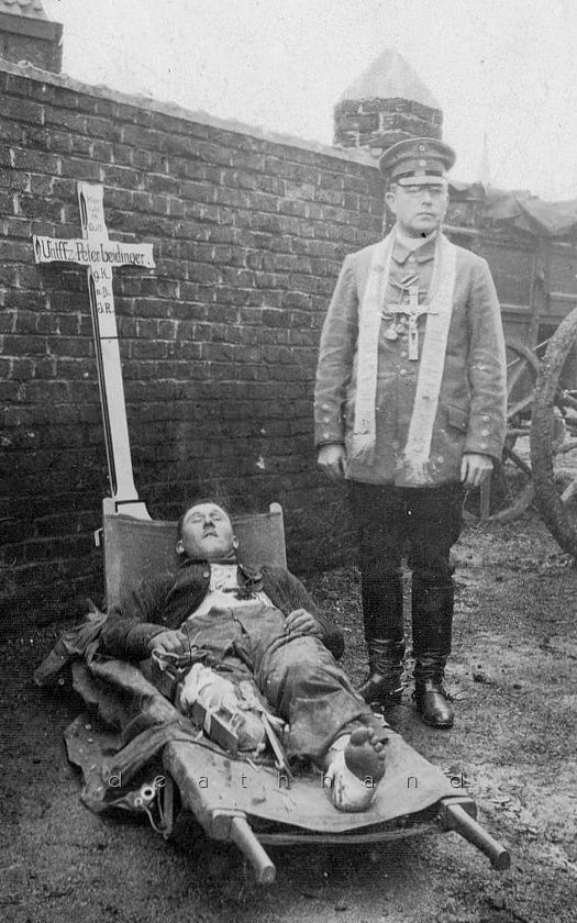 dead-german-w-chaplain-before-burial-Unknown.jpg