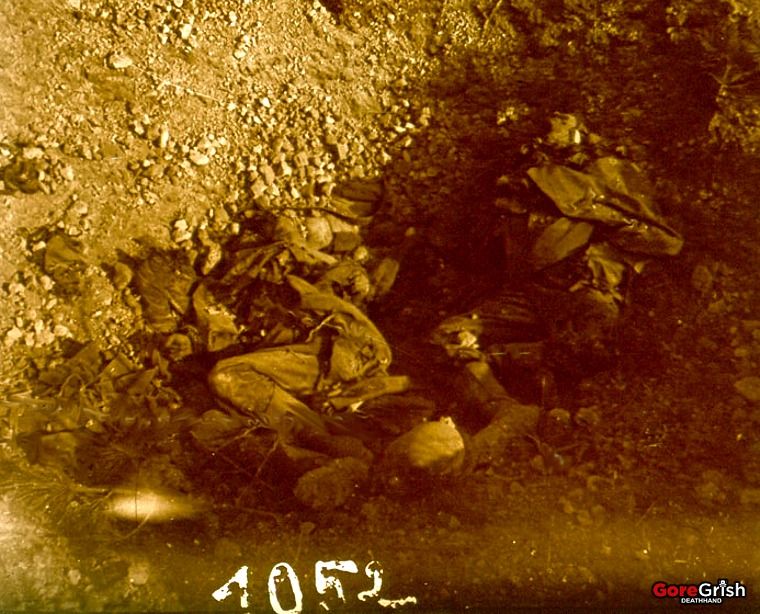 dead-soldiers-in-shell-hole.jpg