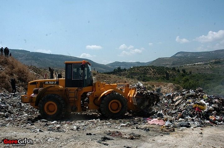 dead-syrians-in-garbage-dump1-Syria.jpg