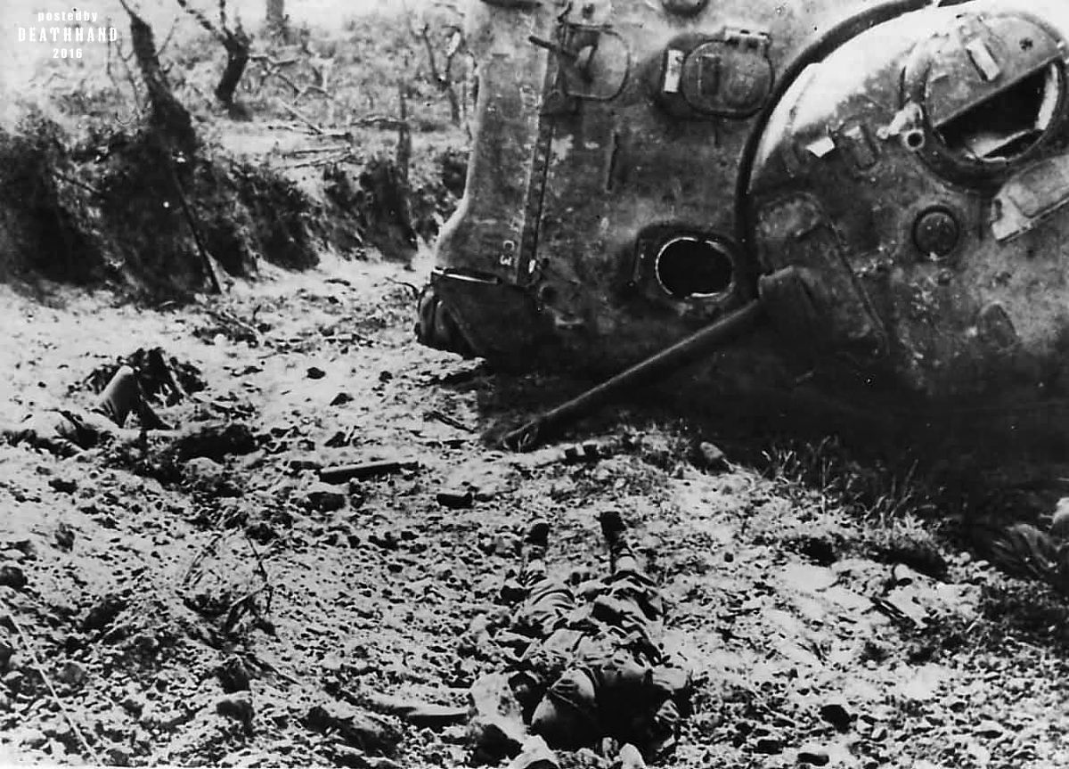 Dead US Infantrymen by M4 Sherman Santa Maria Italy 1944.jpg