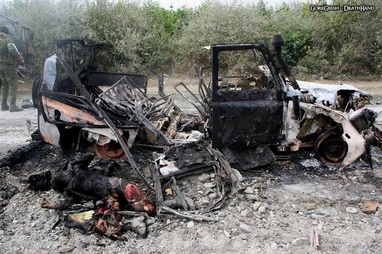 destroyed-vehicles-burned-bodies2-Zchinvali-aug2008.jpg