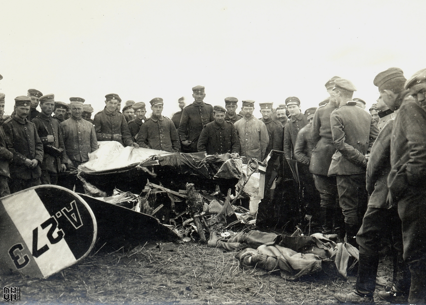 DH - 14 Dead Aviators of WW1 - The battered body of Lt. W.P. Garnett, 60 Sqn RFC, lies before ...jpg
