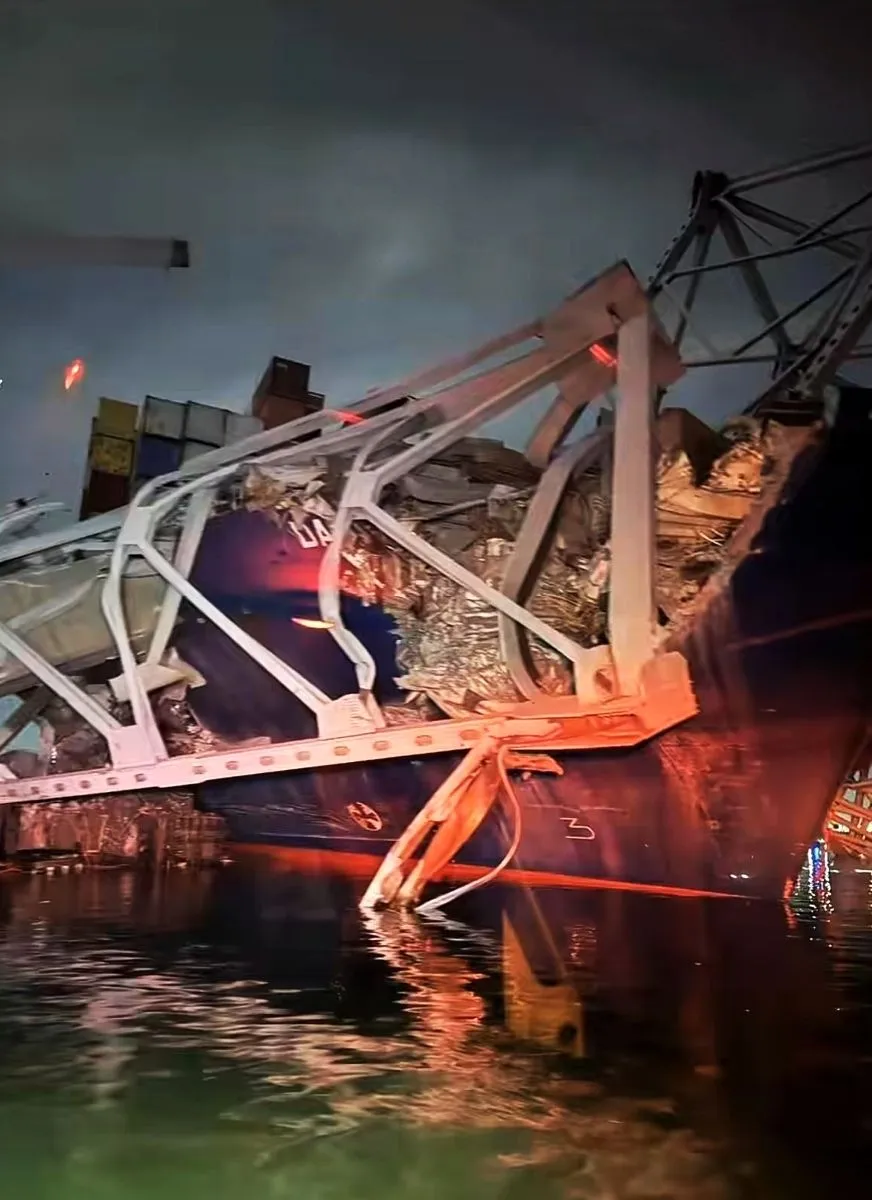 DH - Baltimores Key Bridge hit by cargo ship Dali collapses 9 - Baltimore, USA Mar 25 2024.webp