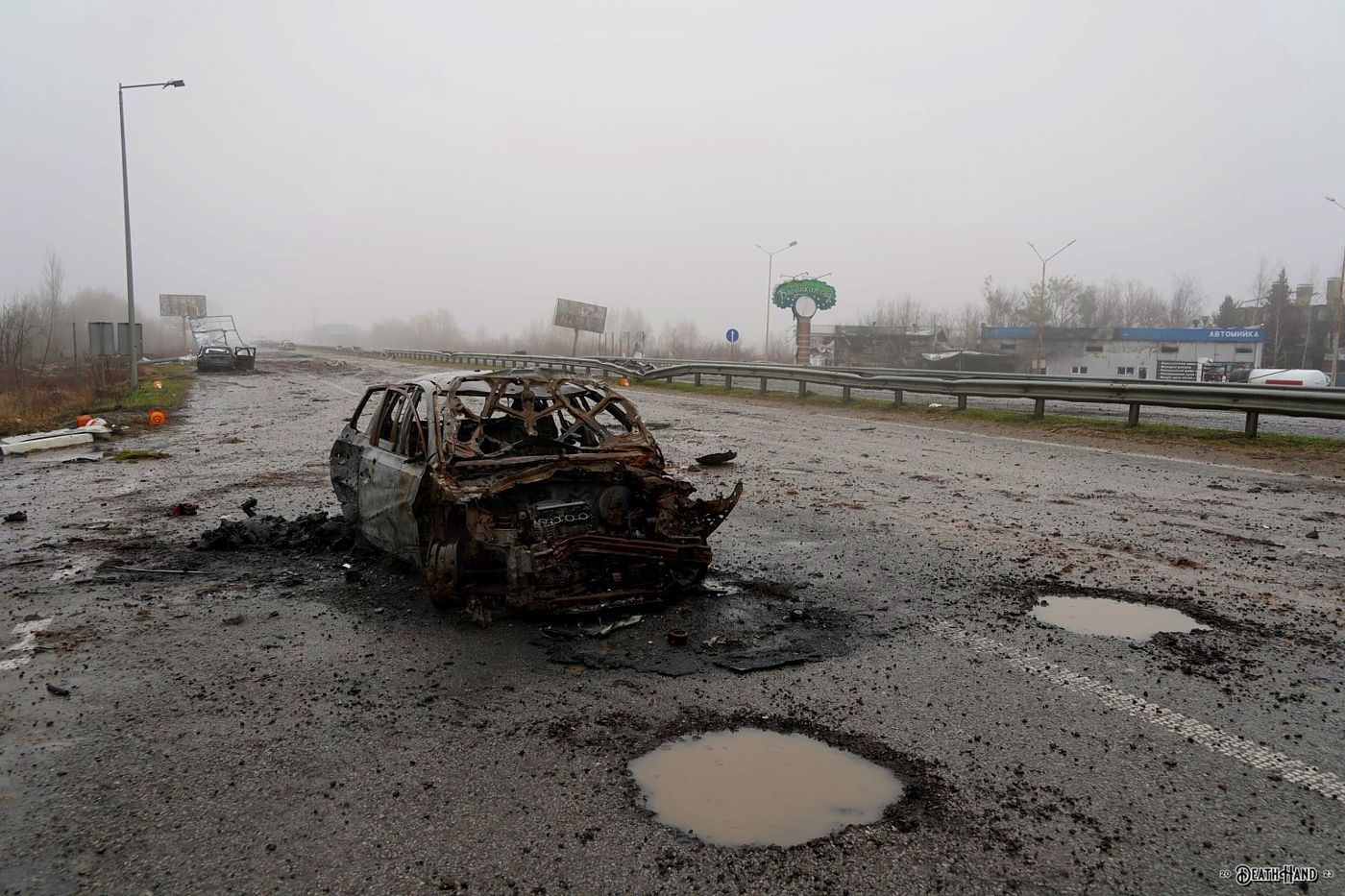 DH - M06 highway carnage beetween towns of Mriia and Myla - Ukraine 4 - early April 2022.jpg