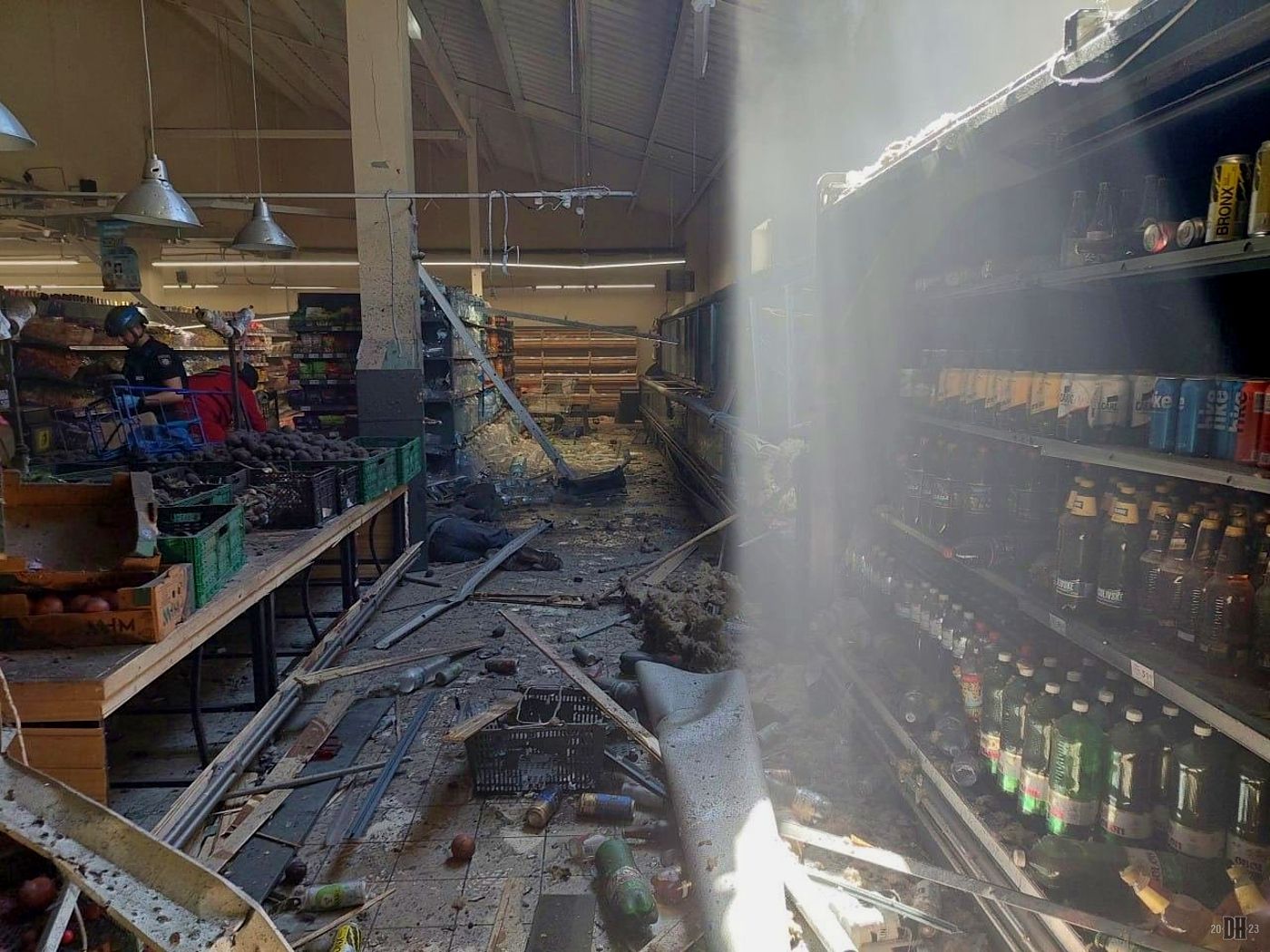 DH - Russian shelling hits supermarket gas and train station 5 - Kherson - Kherson Oblast - Ma...jpg