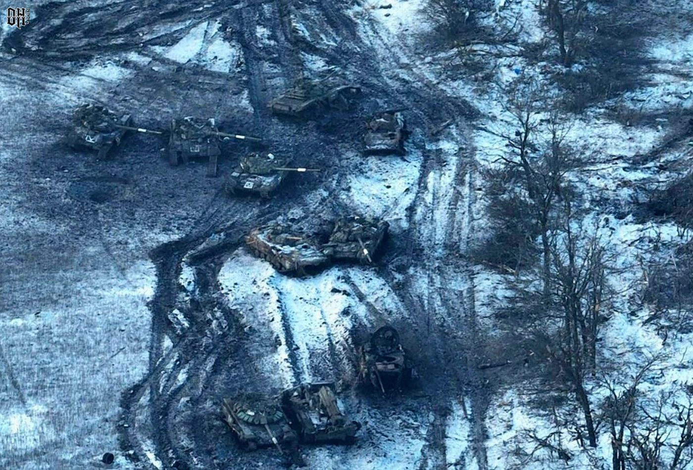 DH - Ukraine~Russia conflict - 1611 - damaged Russian tanks are seen in a field after attempti...jpg