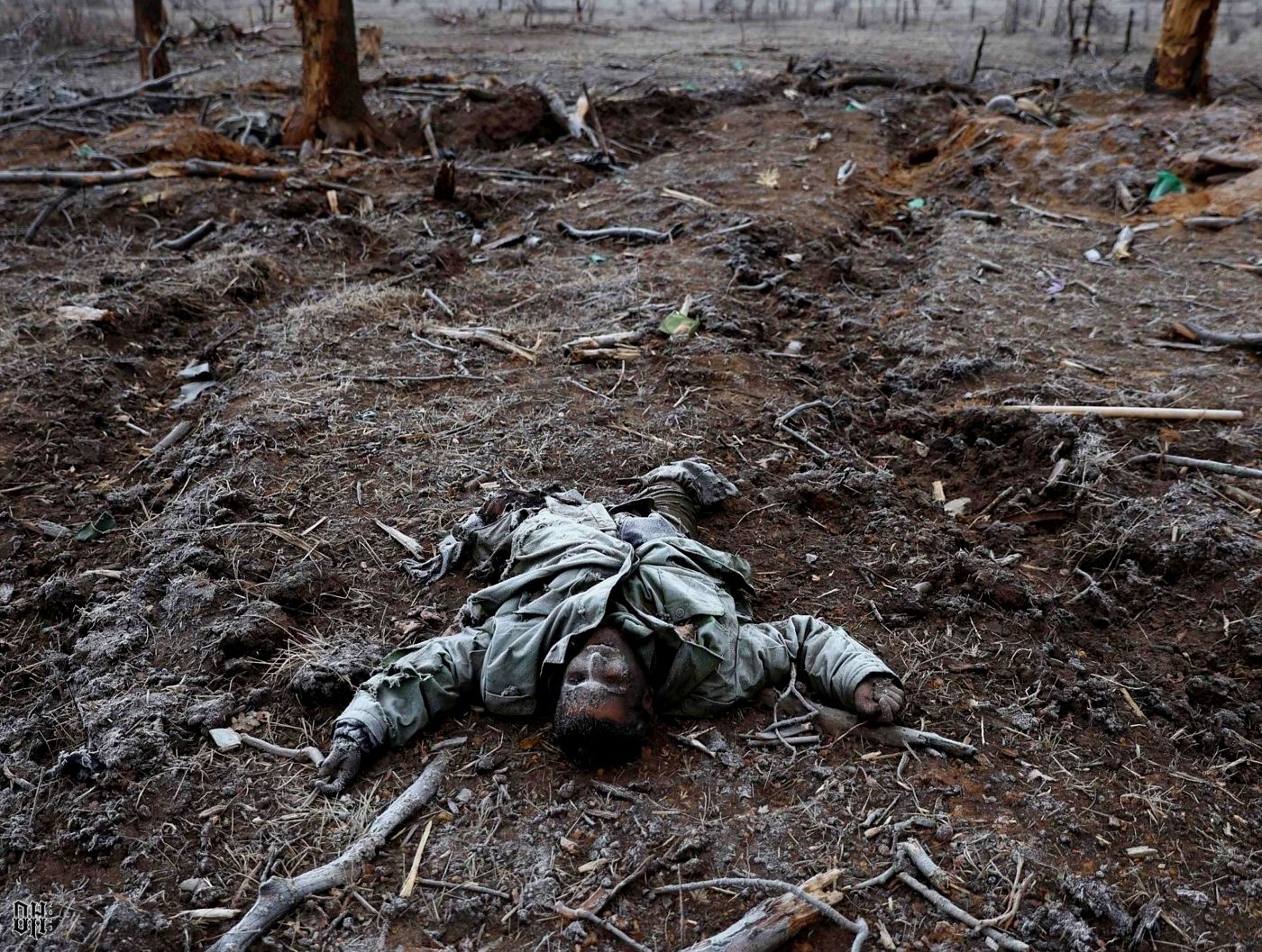 DH - Ukraine~Russia conflict - 1614 - body of a Russian soldier who died in the trenches on th...jpg