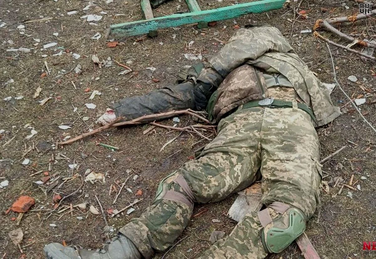 DH - Ukraine~Russia conflict - 1631 - KIA Ukrainian soldier on the edge of Bakhmut in the vill...jpg