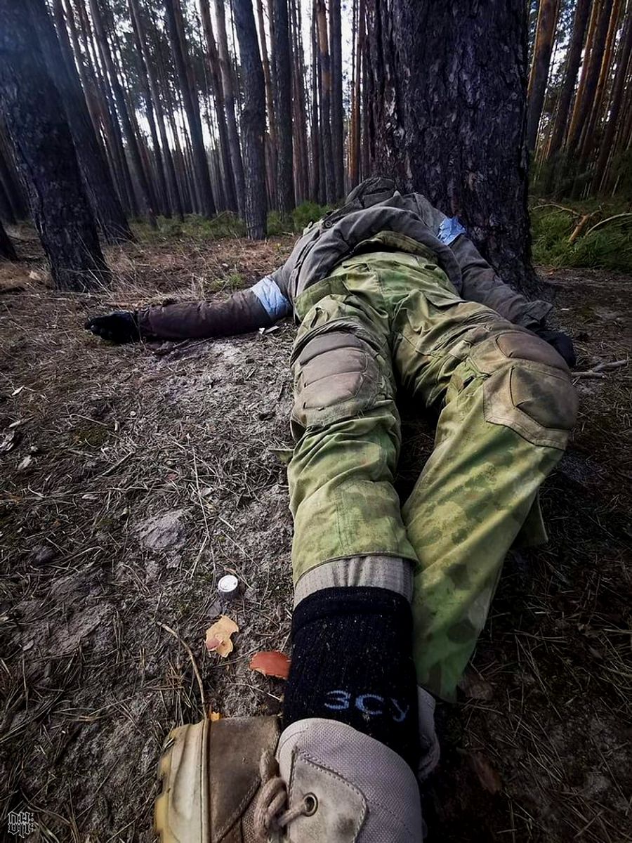 DH - Ukraine~Russia conflict - 1741 - KIA KIA Russian soldier wearing Ukraine army issue socks...jpg