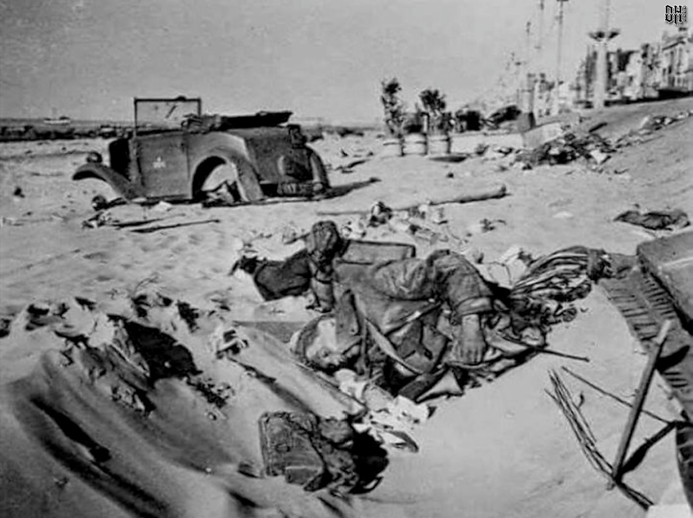 DH - WW2 Dead British Soldiers 8 - British soldier on beach at Dunkirk.jpg