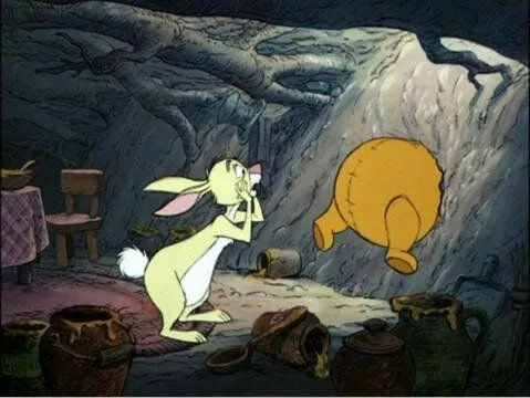 Disney's+The+Many+Adventures+of+Winnie+the+Pooh+(1977)_Pooh+gets+stuck+in+Rabbit's+house.webp