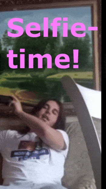 dude in living room makes a selfie#2.gif