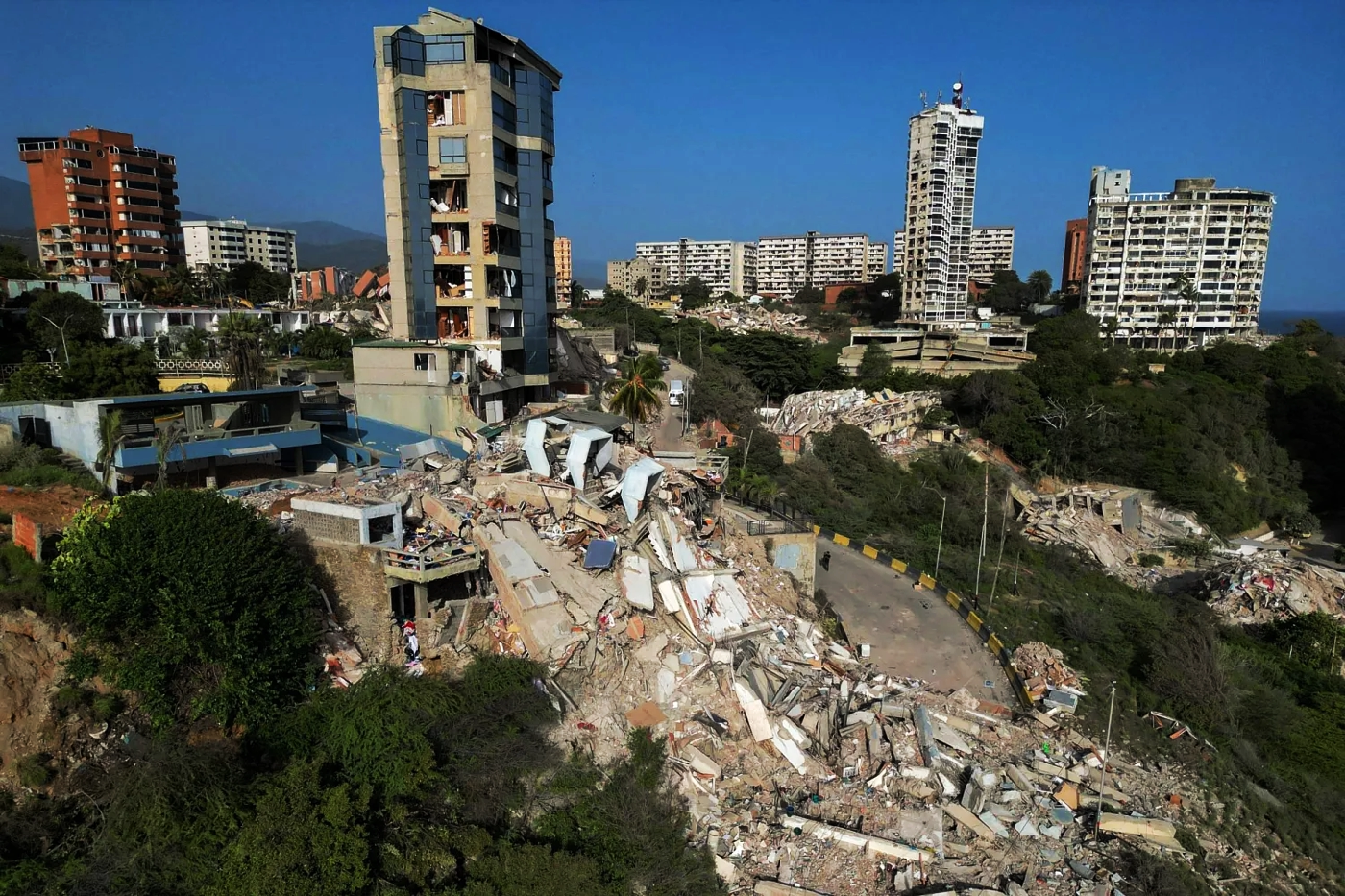 Earthquake aftermath, collapsed buildings in Catia La Mar, La Guaira state, Venezuela, June 2...webp