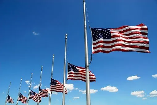 flags-at-half-mast-picture-id487475982.webp