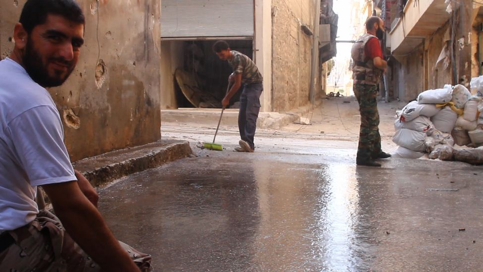 fsa-fighters1-cleaning-post-Aleppo-Syria-sep7-12.jpeg