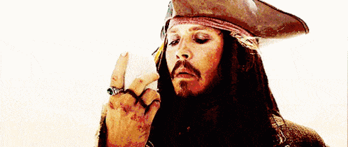 jack-sparrow-licks-rock-rock.gif