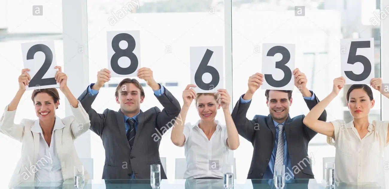 judges-holding-score.webp