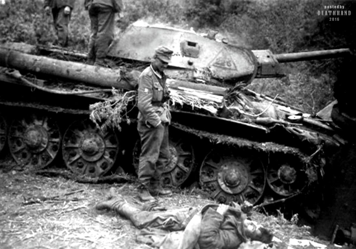 Knocked out Russian tank. dead crewman, Barbarossa, Russia.jpg