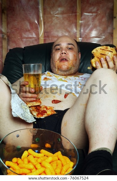 photo-fat-couch-potato-eating-600w-76067524.jpg