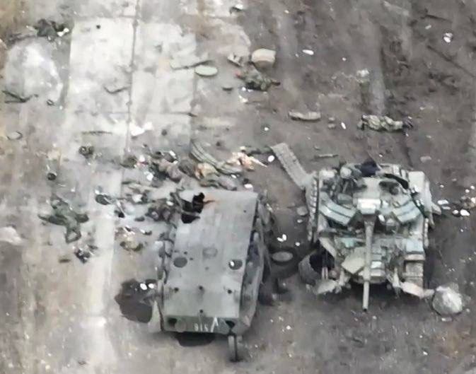 Russian Tank and IFV destroyed with a lot of Russian KIA.jpg