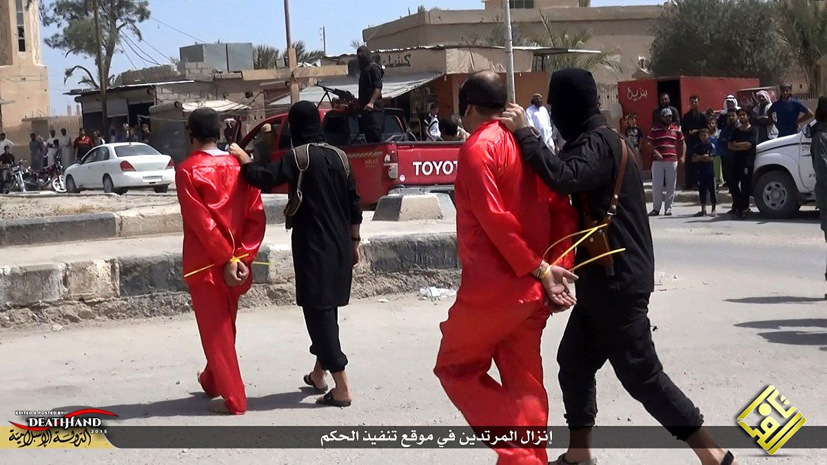 two-accused-spies-executed-then-hung-on-crosses-by-isis-4-Iraq-jun-28-15.jpg