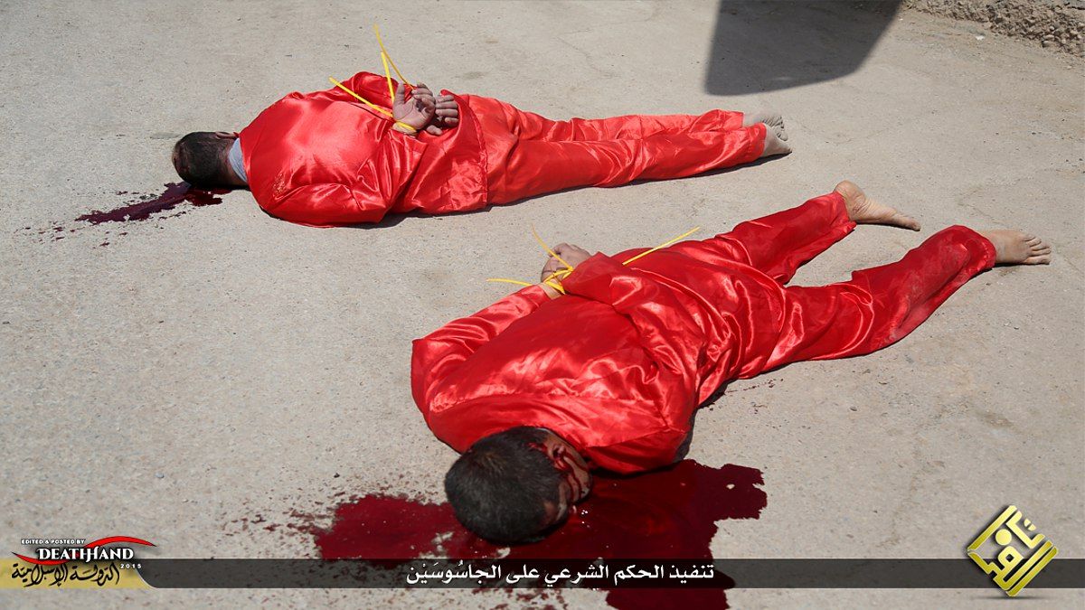 two-accused-spies-executed-then-hung-on-crosses-by-isis-6-Iraq-jun-28-15.jpg