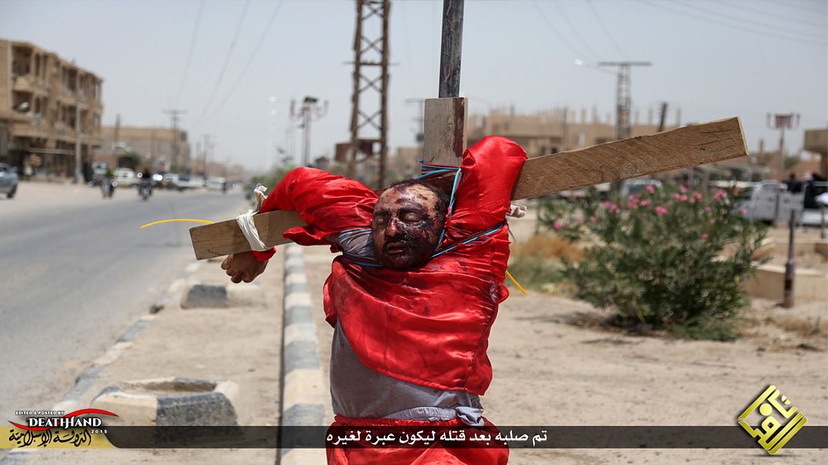 two-accused-spies-executed-then-hung-on-crosses-by-isis-7-Iraq-jun-28-15.jpg