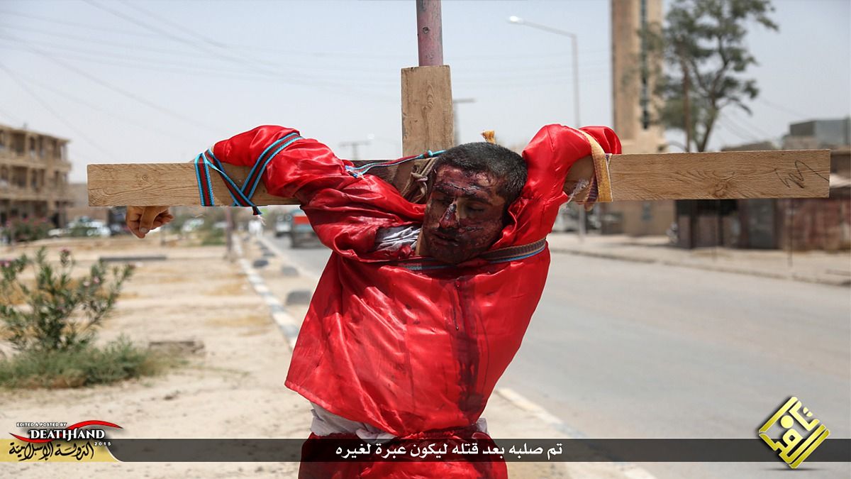 two-accused-spies-executed-then-hung-on-crosses-by-isis-8-Iraq-jun-28-15.jpg