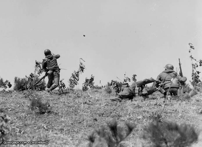 us-platoon-leader-tosses-grenade-Uijong-Bu-Korea-mar23-51.jpg