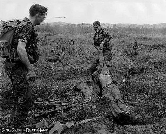 vietnam-spec-ops-pulling-dead-vc-from-hole-Ben-Het-jun21-1969.jpg