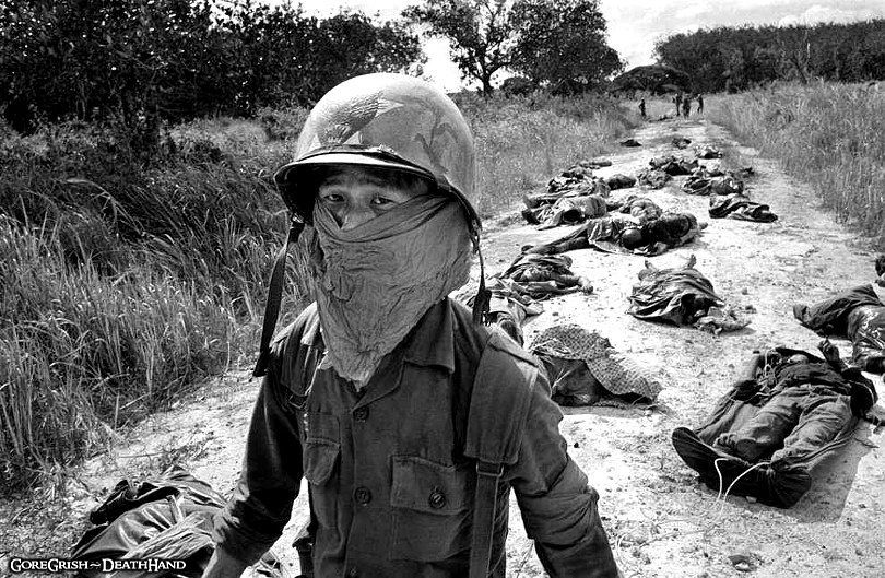 vietnam-stretcher-bearer-bodies-dead-us-and-vietnamese-soldiers-nov27-65.jpg