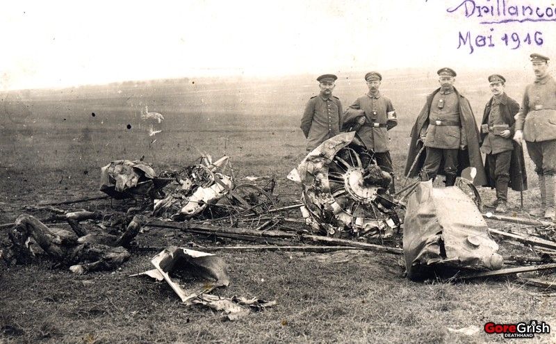 ww1-german-soldiers-pose-with-downed-german-fighter-plane-may18-1916.jpg