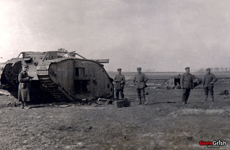 ww1-german-soldiers-with-knocked-out-british-tanks-Cambrai-1917.jpg