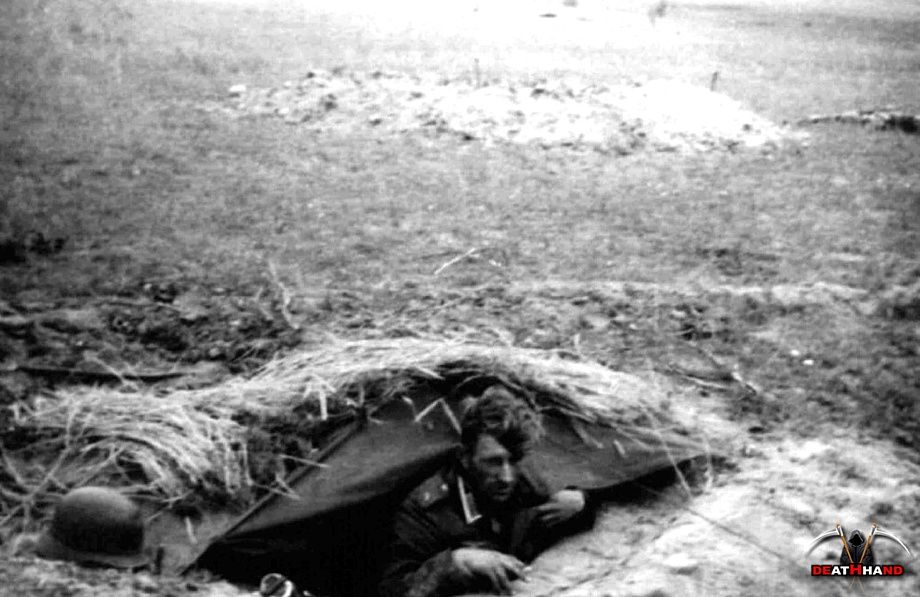 ww2-german-soldier-foxhole.jpg