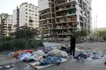 Earthquake aftermath, bodies wrapped in blankets, waiting for collection 2, La Guaira, Venezu...webp