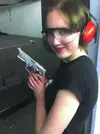 what-is-it-about-hot-women-with-guns.webp