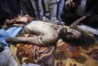 177111-muammar-gaddafi-killed-dead-body-photos-released.jpg