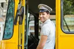 depositphotos_115243918-stock-photo-bus-driver-smiling-while-entering.webp