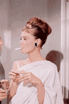 audrey-hepburn-smoking.gif
