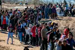 Border wall migrants.webp