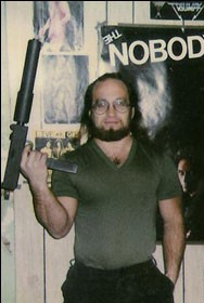 Gary-Evans-w-gun.jpg